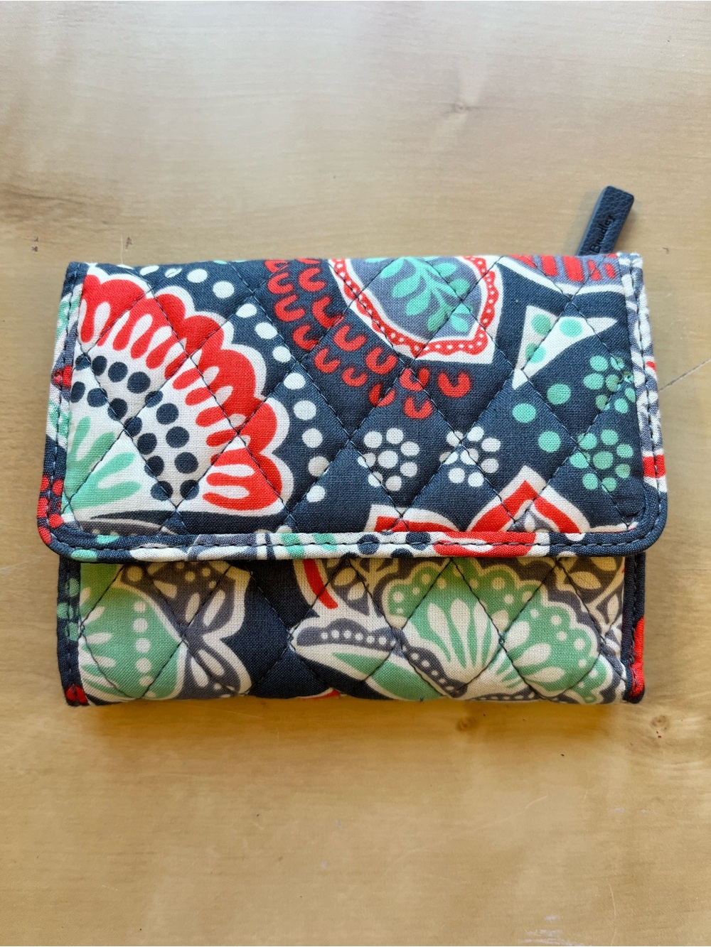 Vera Bradley Nomadic Floral Trifold wallet in Navy with Red and Mint